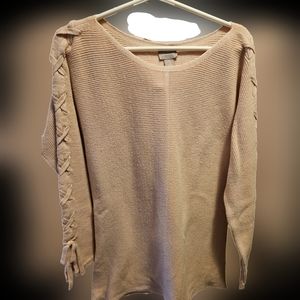 Blush pink color 3/4 length sleeve ribbed sweater with braid tie detail sleeves